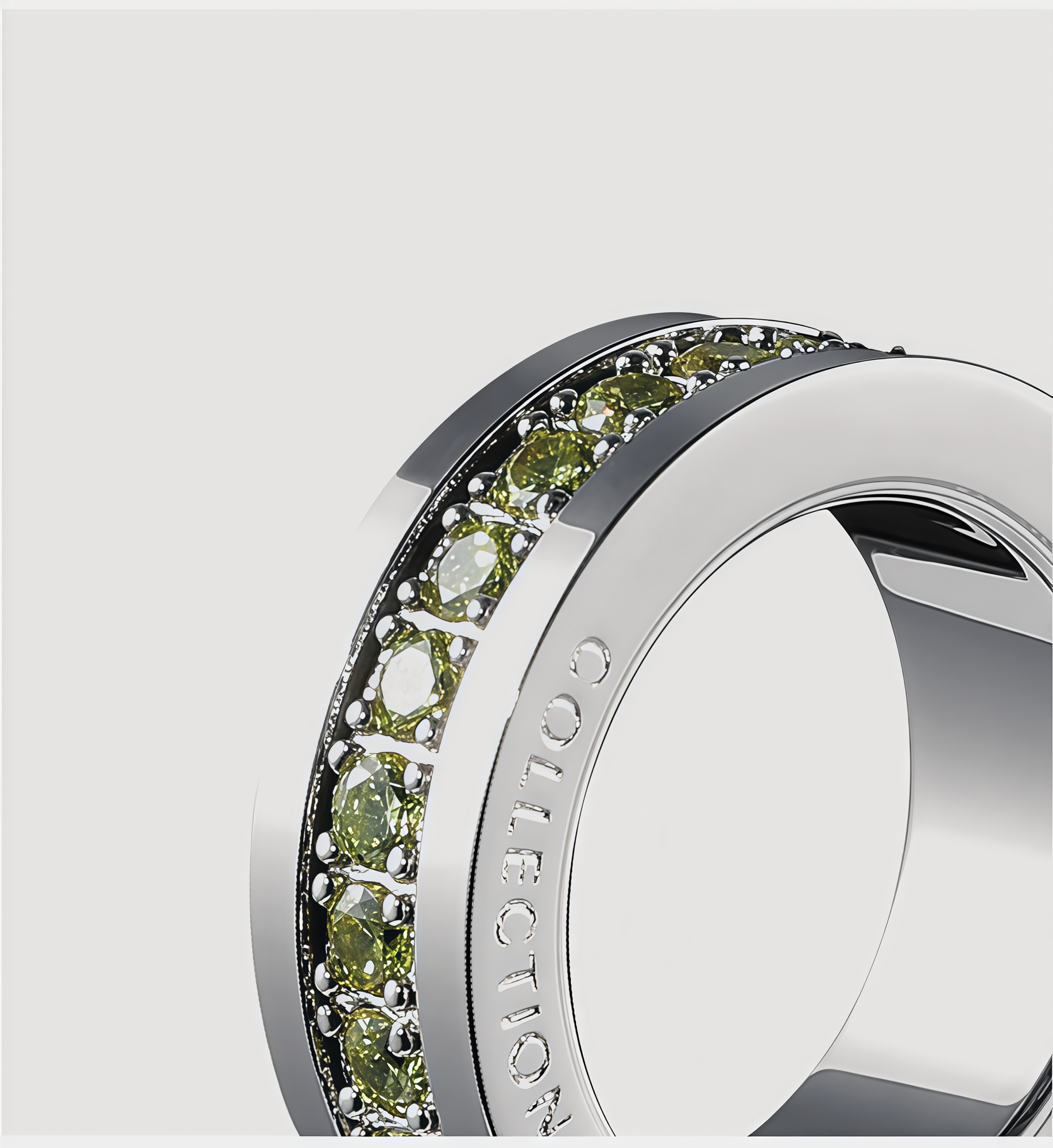 HAZE jewelry ring collection with green stone settings and engraved band