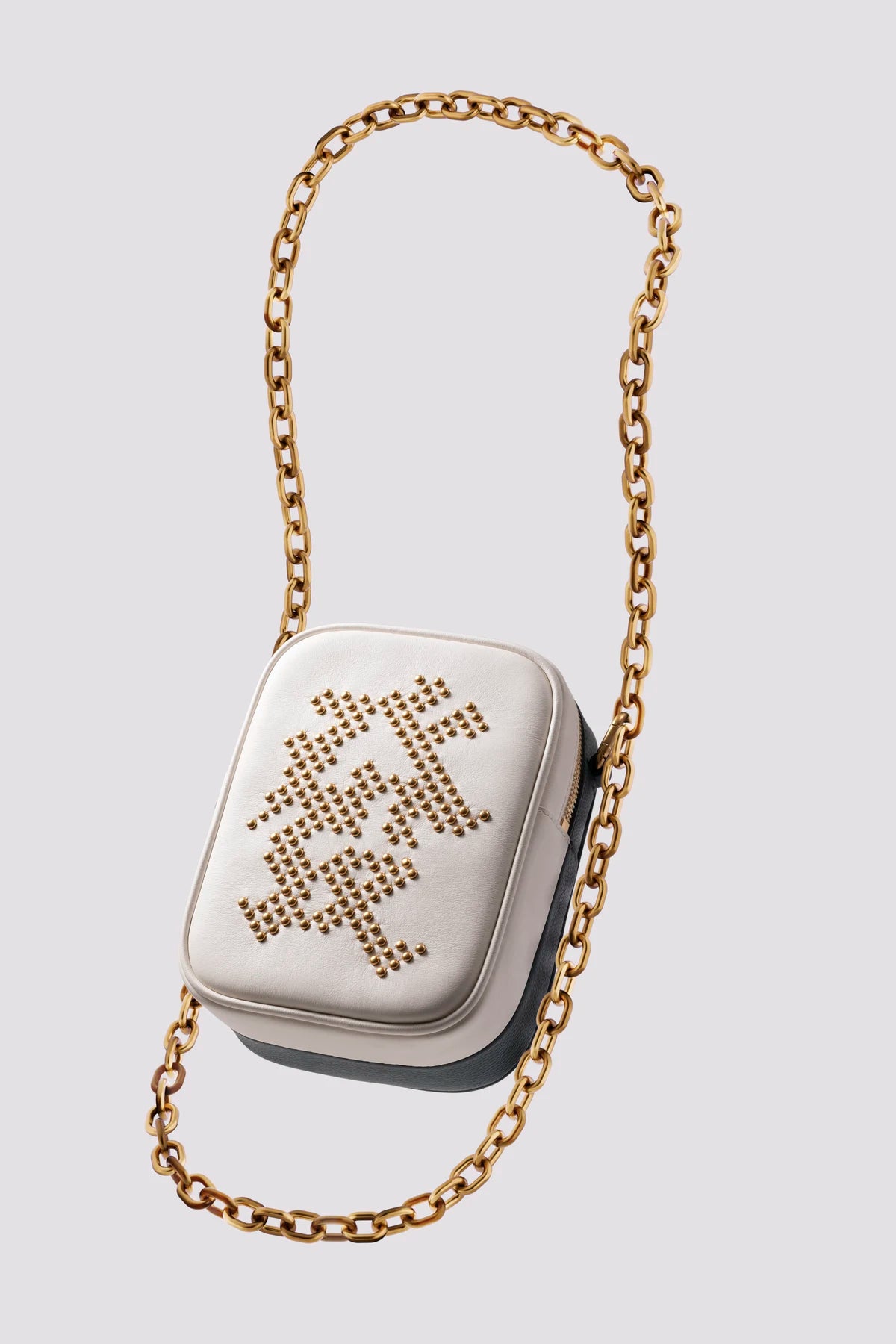 Golden Get Rich Bag worn underarm — gold edition LAOGUI Studio Fā (發) bag styled as an evening statement piece, curated by uniQverse