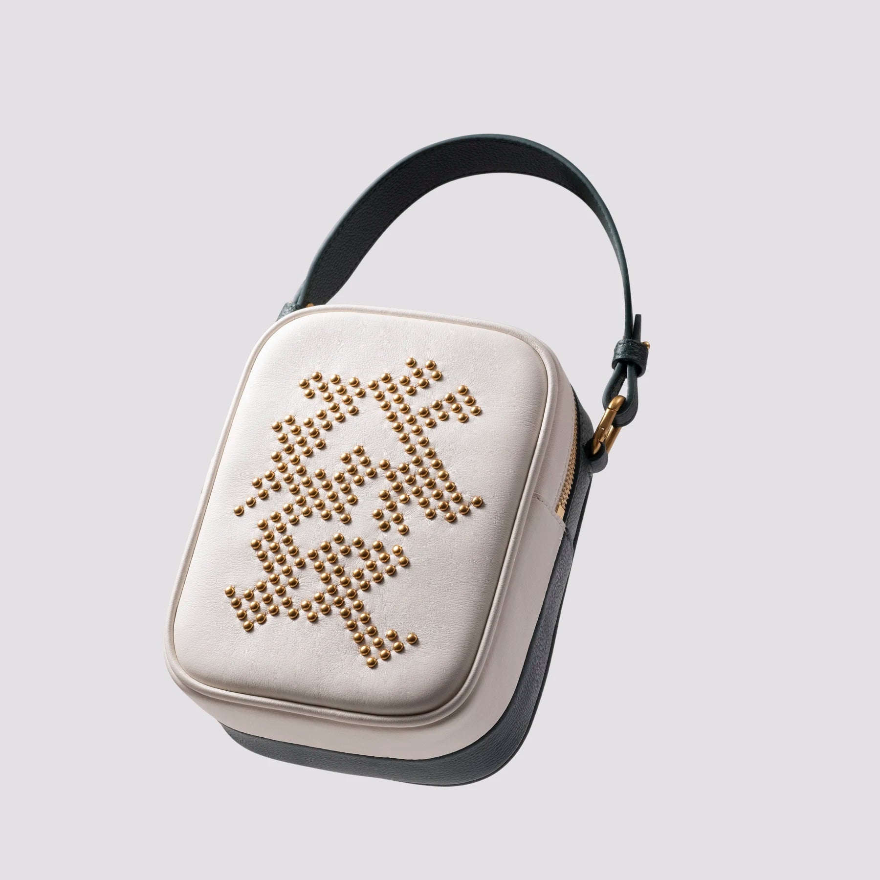 Golden Get Rich Bag (發財包) by LAOGUI held in hand, curated by uniQverse